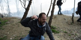 Tempers flare as migrants stuck at Greek-Macedonian border
